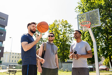 Image showing group of male friends going to play basketball