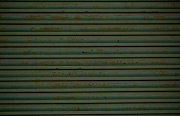 Image showing Old rusting metal security shutters texture