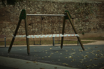 Image showing Cordoned off A-frame swing in a kids playground