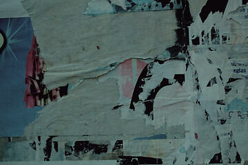 Image showing Background texture of remnants of paper on a wall