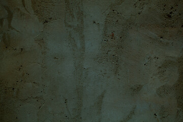 Image showing Grungy dark green wall with faded paint