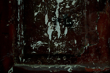 Image showing Grungy old peeling damaged paint on wood