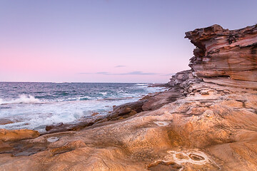 Image showing Cool pink hues of dusk against warm hues of sandstone