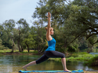 Image showing woman meditating and doing yoga exercise