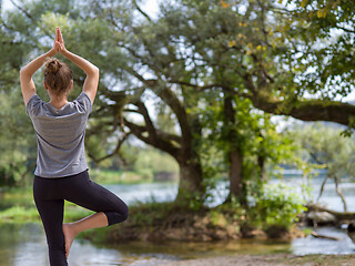 Image showing woman meditating and doing yoga exercise