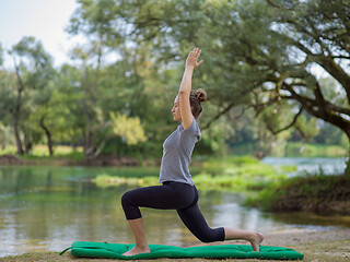 Image showing woman meditating and doing yoga exercise