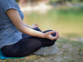 Image showing woman meditating and doing yoga exercise