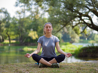 Image showing woman meditating and doing yoga exercise