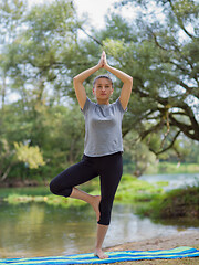 Image showing woman meditating and doing yoga exercise