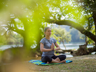 Image showing woman meditating and doing yoga exercise