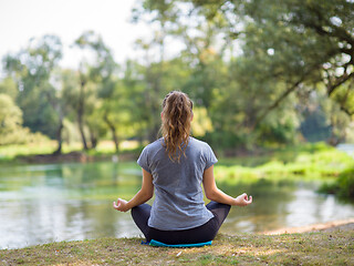 Image showing woman meditating and doing yoga exercise