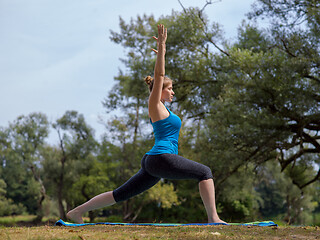 Image showing woman meditating and doing yoga exercise