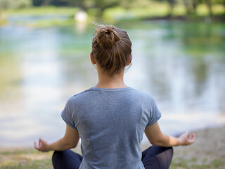 Image showing woman meditating and doing yoga exercise