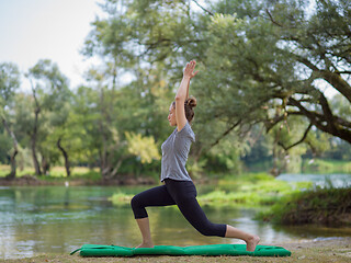 Image showing woman meditating and doing yoga exercise