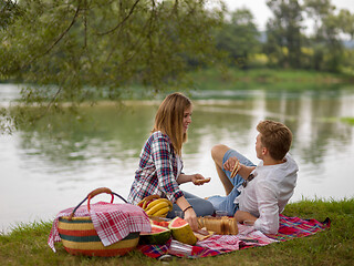 Image showing Couple in love enjoying picnic time