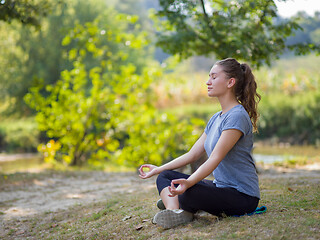 Image showing woman meditating and doing yoga exercise