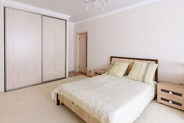 Image showing Interior of a spacious, light, cozy bedroom