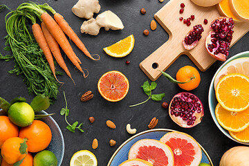 Image showing different vegetables and fruits on on slate table