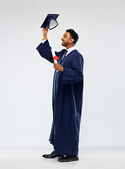 Image showing male graduate student in mortar board with diploma