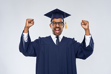 Image showing happy indian graduate student celebrating success