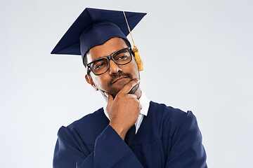 Image showing indian graduate student in mortar board thinking