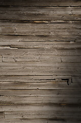 Image showing Weathered wooden wall with unpainted planks