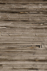 Image showing Weathered wooden wall with unpainted planks