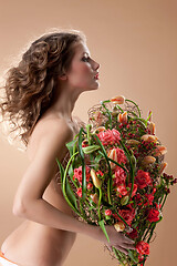 Image showing Young Woman With Flowers