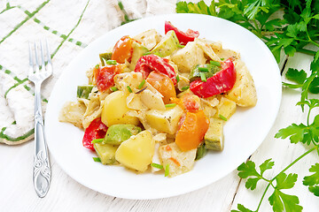 Image showing Ragout vegetable with zucchini on wooden board