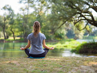 Image showing woman meditating and doing yoga exercise