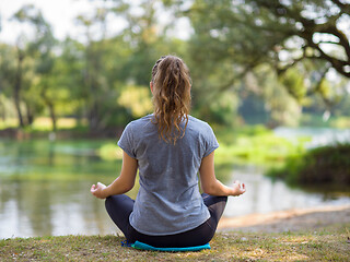 Image showing woman meditating and doing yoga exercise