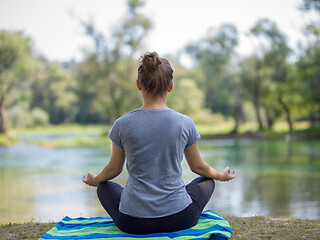 Image showing woman meditating and doing yoga exercise