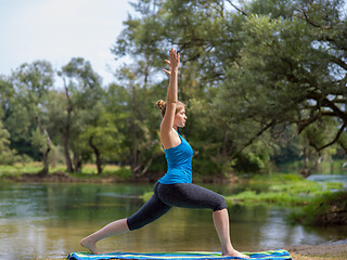 Image showing woman meditating and doing yoga exercise