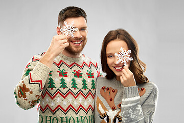 Image showing happy couple at christmas ugly sweater party