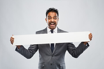 Image showing happy indian businessman with white banner