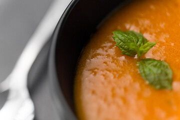 Image showing close up of vegetable pumpkin cream soup in bowl