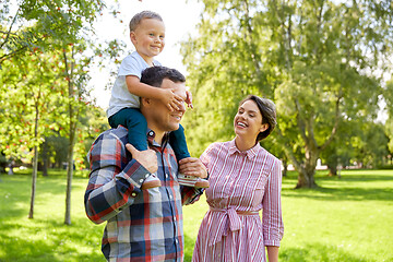 Image showing happy family having fun at summer park