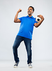 Image showing football fan with soccer ball celebrating victory