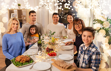 Image showing happy family having dinner party at home