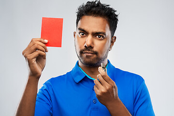 Image showing indian referee with whistle showing red card