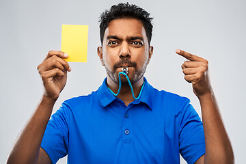 Image showing indian referee whistling and showing yellow card
