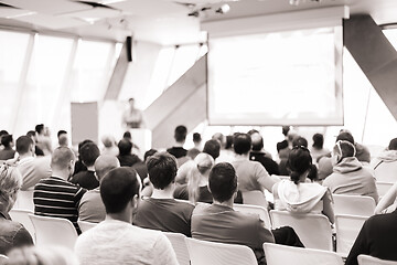 Image showing Male speeker having talk at public event.