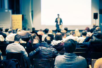 Image showing Business speaker giving a talk at business conference event.