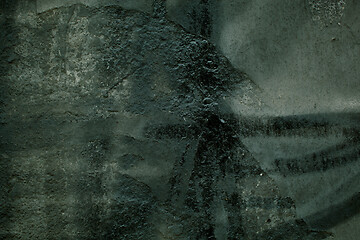 Image showing Dark grungy old wall with messy brush strokes