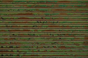 Image showing Old metal shutters with grunge green paint