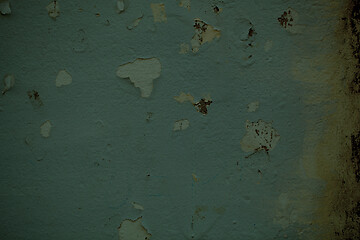 Image showing Dingy green wall background texture with damp