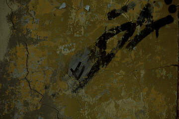 Image showing Abstract black graffiti on an old grunge wall