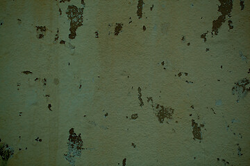 Image showing Grunge off white stained wall with flaky paint