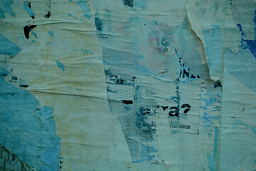 Image showing Remainder of old posters and notices on a wall