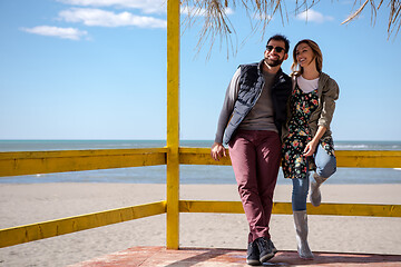 Image showing Couple chating and having fun at beach bar